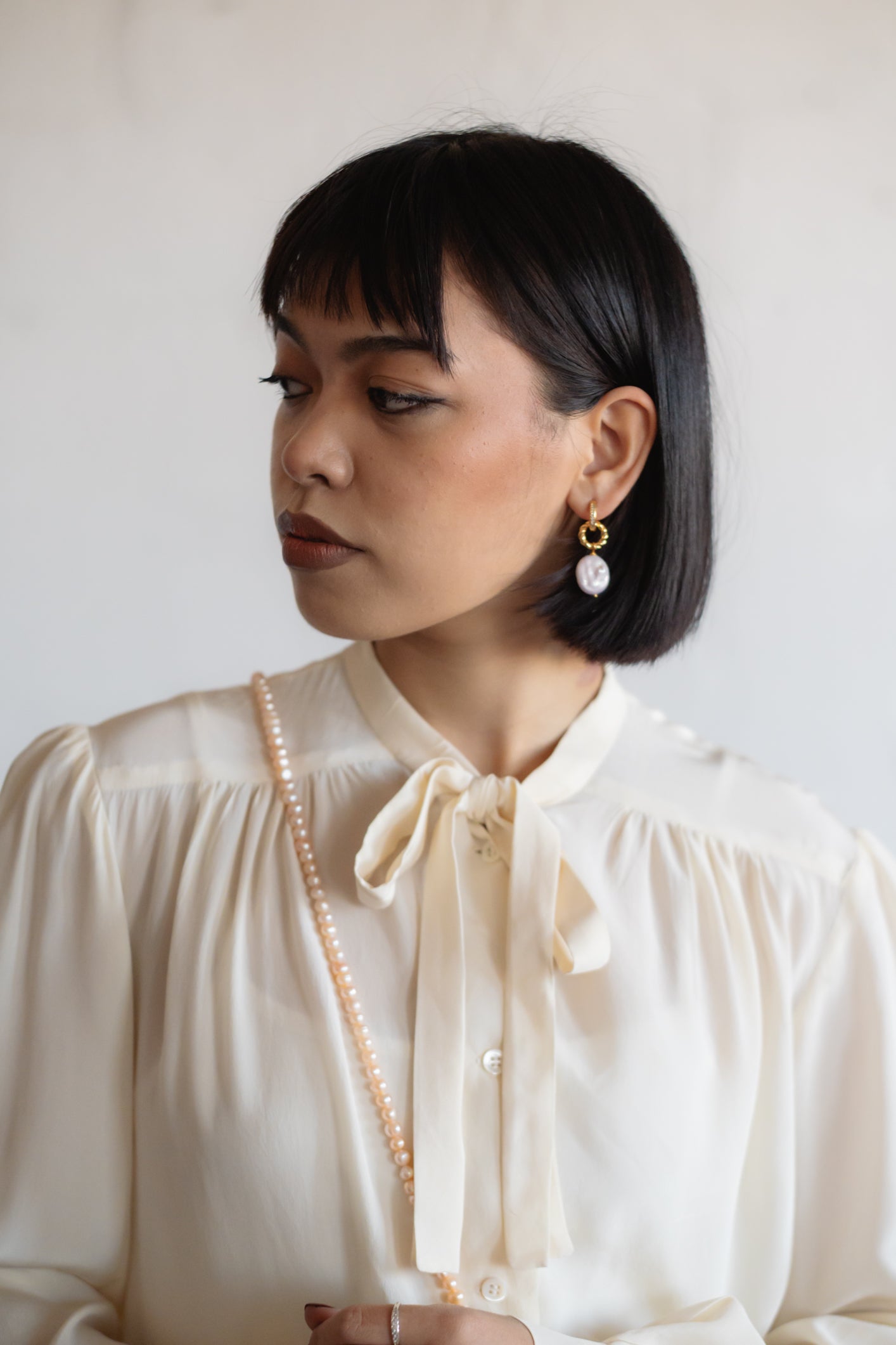 Cream Silk Tie-Neck Blouse